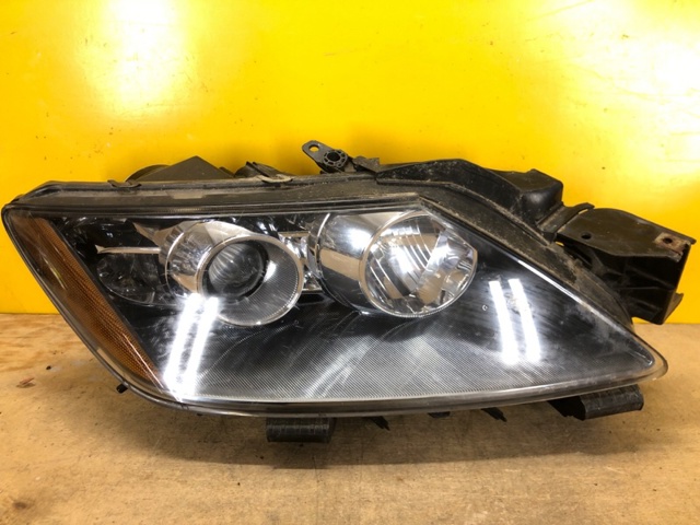 Фара правая EH1051030 MAZDA
