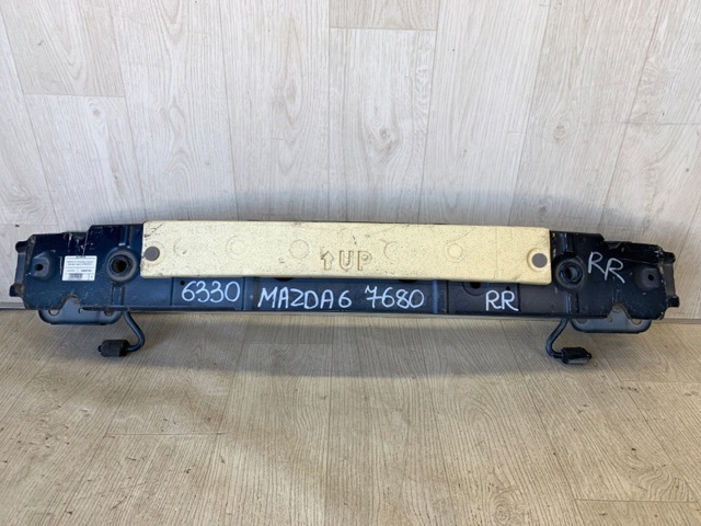 Буфер бампера заднього GJR950260 MAZDA