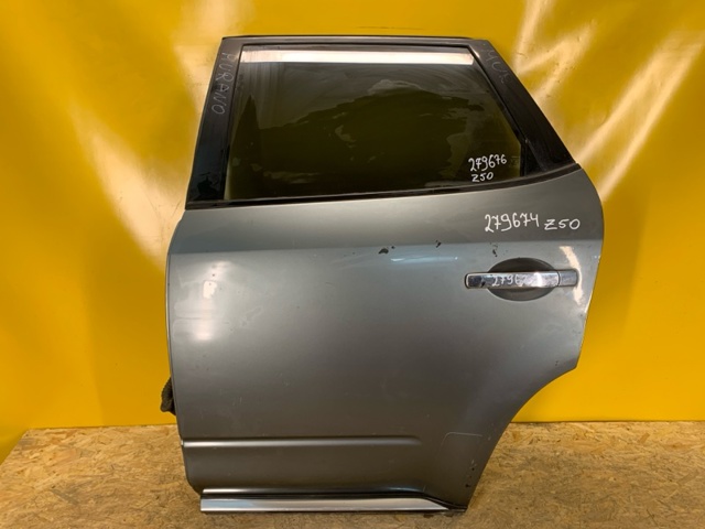 Двері задні, ліві H2101CB0MM NISSAN