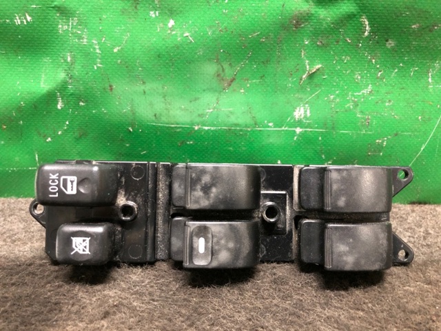 Кнопки переднього лівого склопід'ємника MR587943 MITSUBISHI