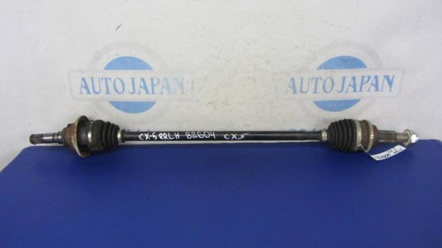 Піввісь задня, ліва RTA12560XB MAZDA