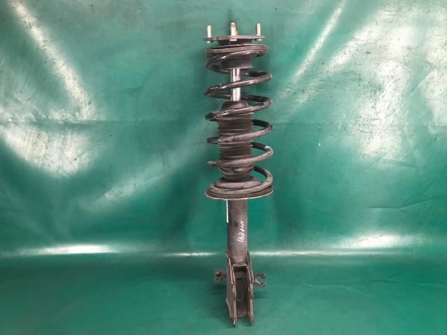Амортизатор передньої підвіски TD1134700B MAZDA