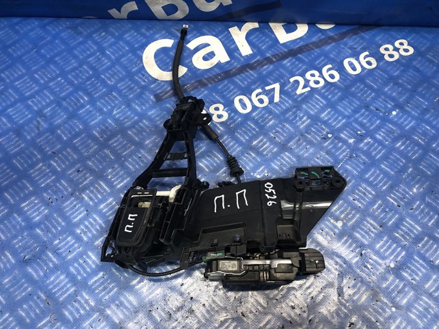 Замок передніх пасажирських дверей 32353632 VOLVO