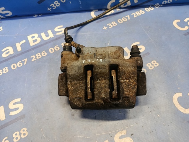 Супорт гальмівний, передній, правий 7701206726 RENAULT