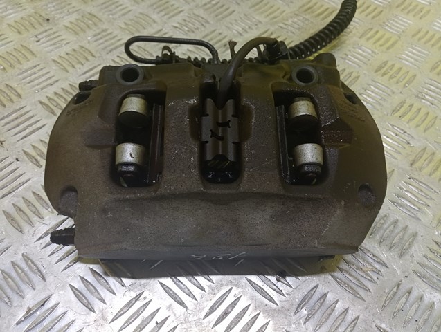 Супорт гальмівний задній правий 7P0615424 VAG