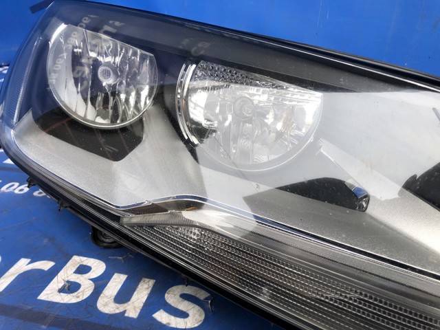 Фара передня права 7P2941006 VAG