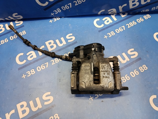 Супорт гальмівний задній правий 8K0615404E VAG