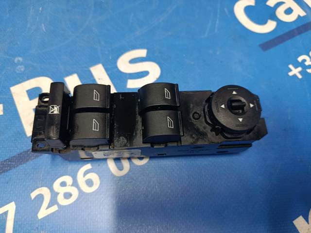 Кнопки переднього лівого склопід'ємника BM5T14A132AA FORD