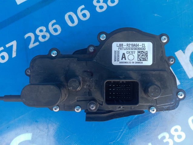 Замок двері правої передньої LJ8Z58219A64N FORD