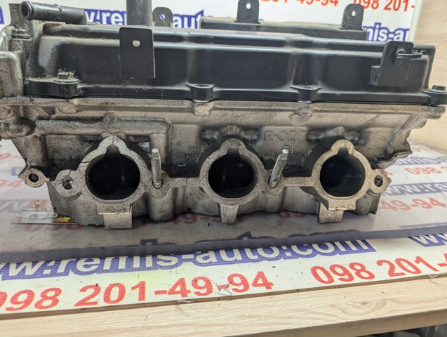 Головка блока циліндрів (ГБЦ), права 11040CD700 NISSAN