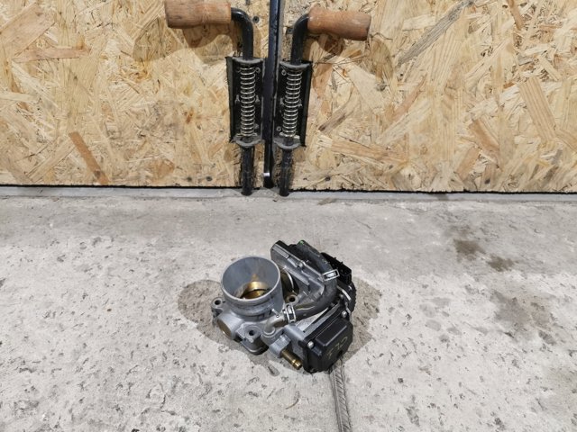 Дросільна заслінка в зборі 164005WJA01 HONDA