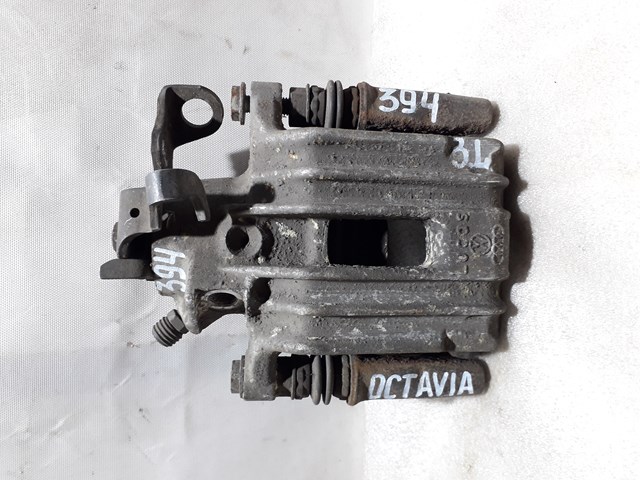 Задній гальмівний супорт лівий 1J0615423B VAG