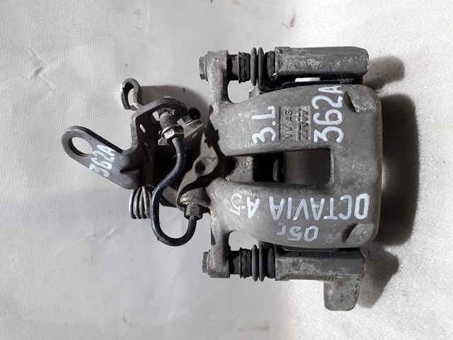 Задній гальмівний супорт лівий 1K0615423J VAG