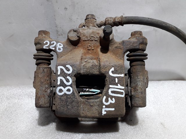 Задній гальмівний супорт лівий 44011EM11A NISSAN
