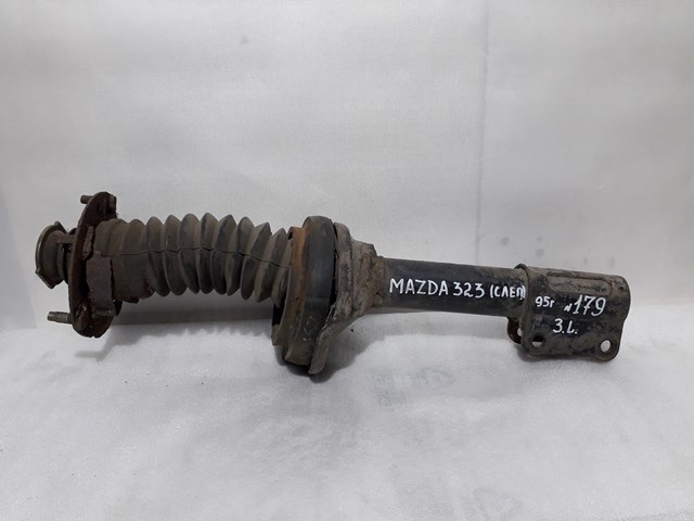 Амортизатор задній, лівий BC1G28900B MAZDA