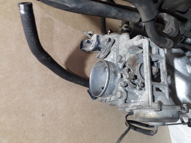 Дросільна заслінка в зборі MN135985 MITSUBISHI