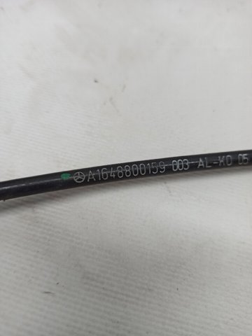 Трос замка капота A1648800159 MERCEDES