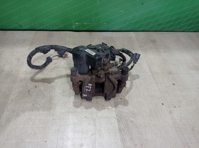 Супорт гальмівний задній правий DG9Z2552B FORD