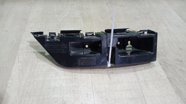 Кронштейн бампера заднього, лівий KT4B17D949A FORD