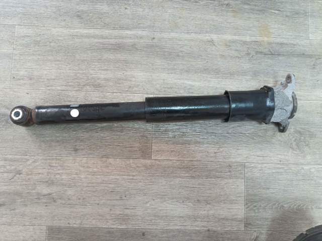 Амортизатор задній TK4828910J MAZDA