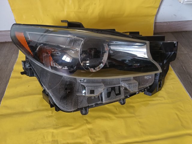 Фара передня права TK49510K0E MAZDA