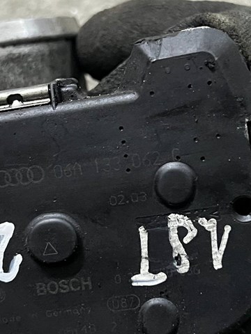 Дросільна заслінка в зборі 06A133062C VAG
