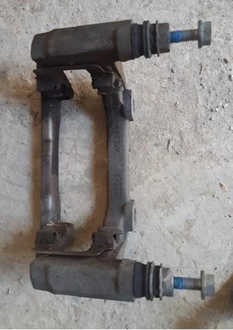 Скоба гальмівного заднього супорта LR036570 LAND ROVER