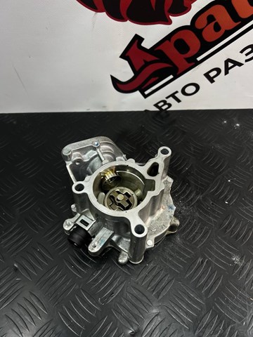 Насос вакуумний 06K145100BB VAG