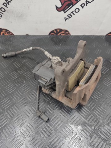 Супорт гальмівний задній правий 4M0615404A VAG