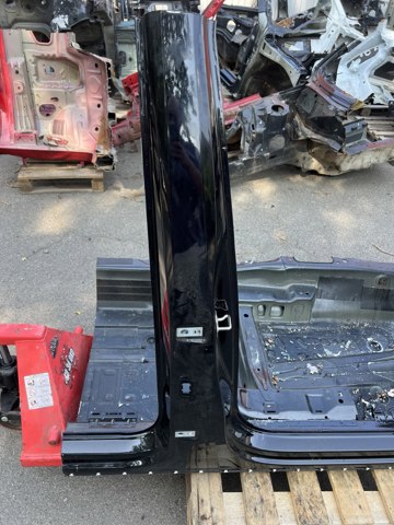 Амортизаційна стійка центральна, права 5NN809220B VAG
