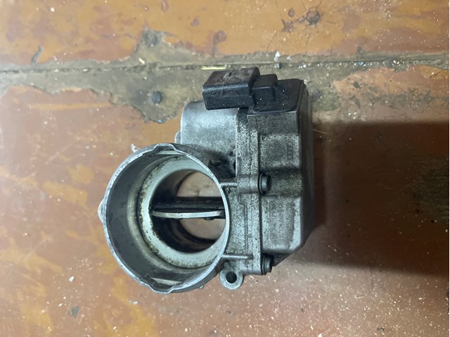 Дросільна заслінка в зборі 03G128063 VAG