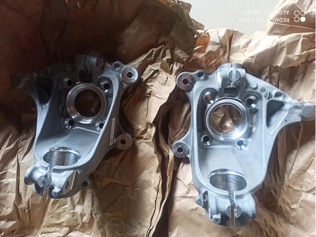 Цапфа поворотна права 31216876646 BMW