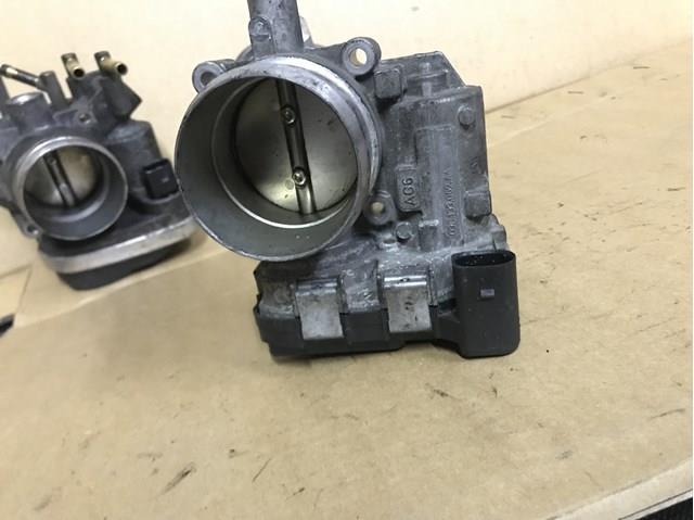 Дросільна заслінка в зборі 03C133062AA VAG