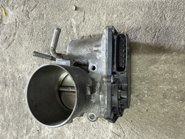 Дросільна заслінка в зборі 351002E610 HYUNDAI