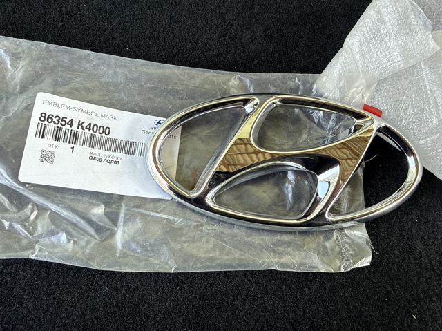 Емблема переднього бампера 86354K4000 HYUNDAI