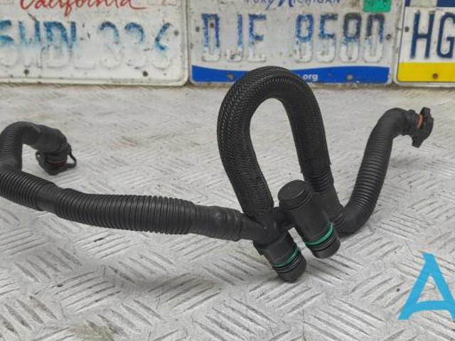 Трубка відводу кар.газов 06E103217AD VAG