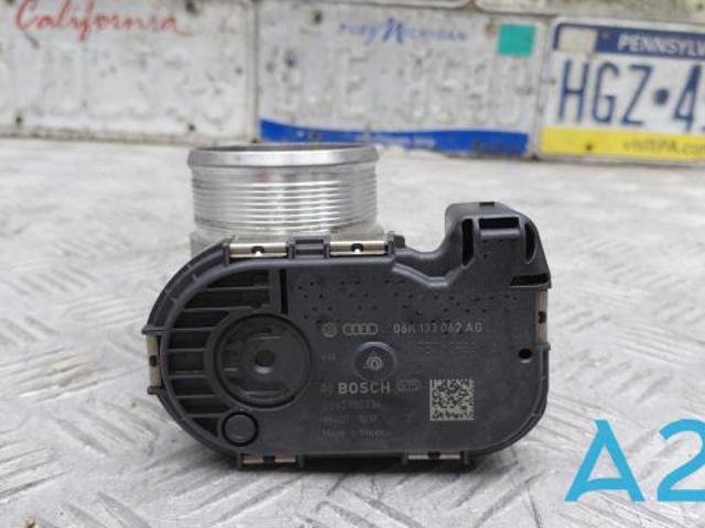 Дросільна заслінка в зборі 06K133062AG VAG