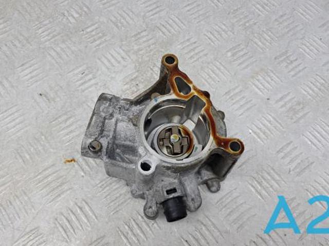 Насос вакуумний 06K145100CB VAG