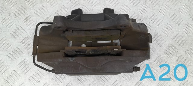 Супорт гальмівний, передній, лівий 100779400C TESLA