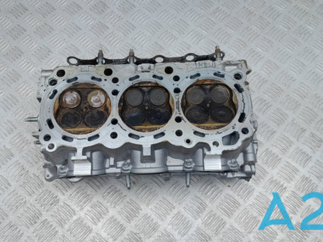 Головка блоку циліндрів 110404GA0A NISSAN