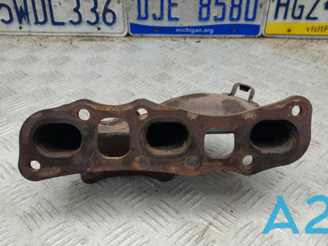 Колектор випускний задній 14002JA10A NISSAN