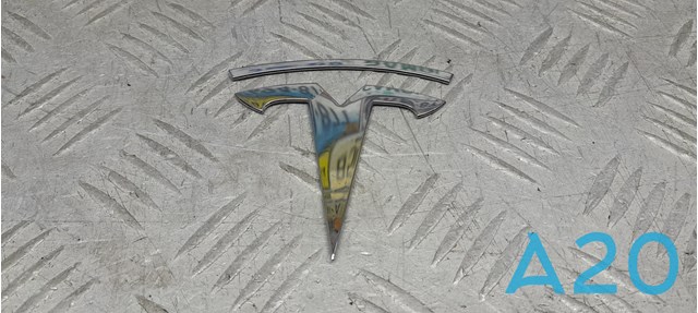 Емблема капота 149494900A TESLA