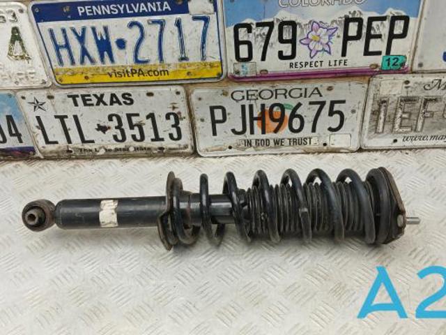 Стійка амортизатора задня 20365AN01A SUBARU