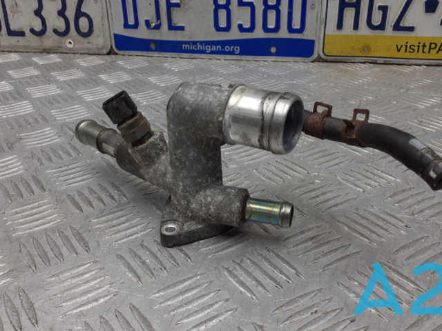 Кожух термостата 256002E000 HYUNDAI