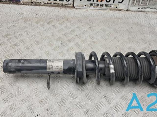 Амортизатор передньої підвіски, лівий 31316866613 BMW