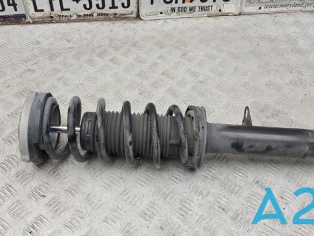 Амортизатор передньої підвіски 31316866614 BMW