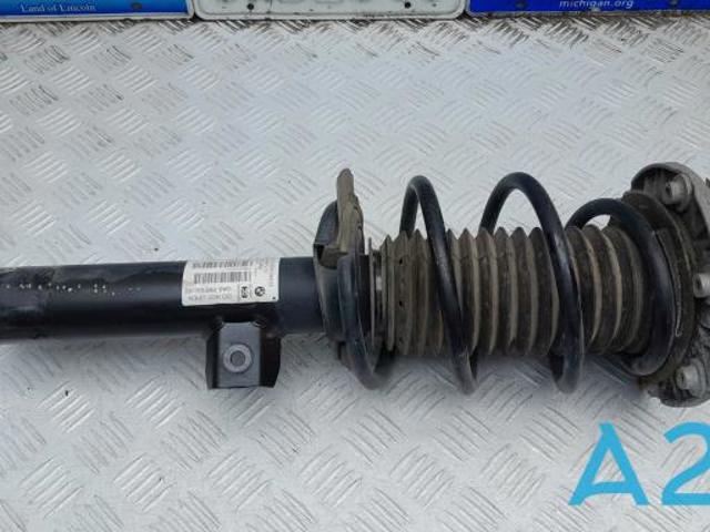 Амортизатор передньої підвіски 31316873726 BMW