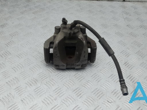 Задній гальмівний супорт лівий 34216786831 BMW