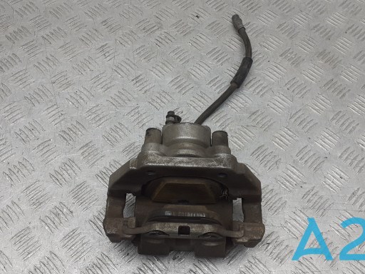 Супорт гальмівний задній правий 34216786832 BMW