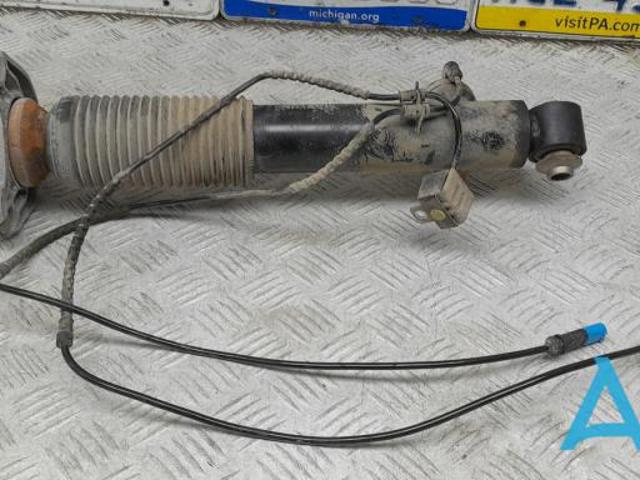 Амортизатор задній, лівий 37106875089 BMW